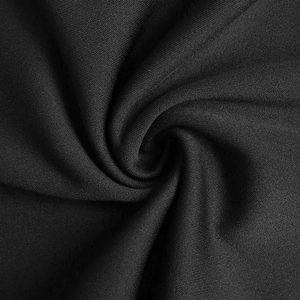 Gros plan macro sur la texture du tissu jacquard en dentelle noire avec détails fins