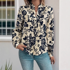 Vintage floral pintuck blouse with stand collar and long sleeves for a classic look