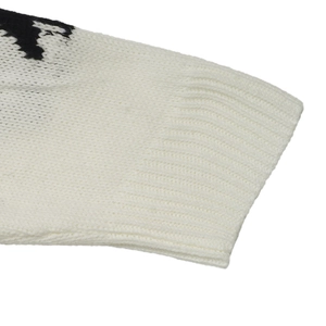 White crewneck knit sweater featuring ribbed cuffs and black floral sleeve patterns
