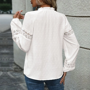 Elegant white Swiss dot lace long sleeve blouse with intricate hollow out details