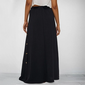 Women's black high-waisted maxi skirt with decorative side buttons and A-line silhouette
