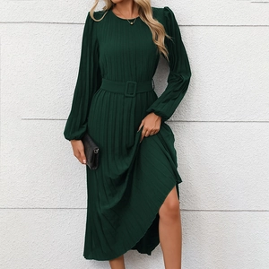 Elegant dark green pleated maxi dress with long lantern sleeves and a matching square buckle belt