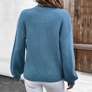 Women's light blue ribbed knit cardigan with stand collar and long sleeves, back view