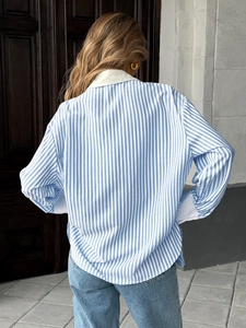 Women's blue and white striped shirt with white contrast collar and cuffs in loose fit