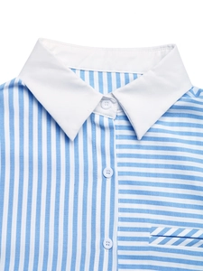 Detail of blue and white striped shirt featuring white collar and buttoned front