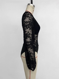 Detailed side view of black lace bodysuit featuring intricate floral patterns and V-neckline