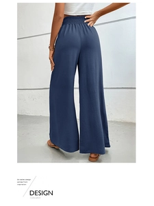 Vue arrière du pantalon large à taille haute avec ceinture élastique froncée bleu foncé