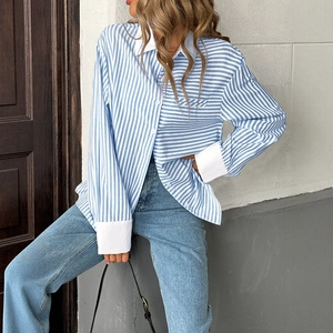Women's blue and white striped cardigan shirt with white collar and pocket contrast detail