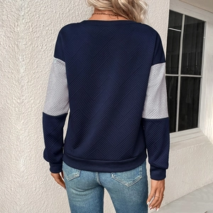 Rear view of navy blue and grey color-block sweatshirt with geometric jacquard texture