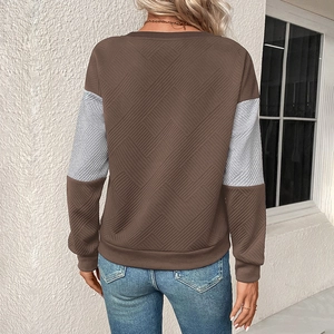 Women's color block sweatshirt with textured diamond patterns and dark brown sleeves