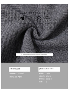 Detail view of dark grey hoodie A8730 showing waffle knit texture and fabric features