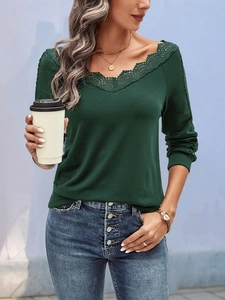 Detailed V-neck lace patchwork on dark green long sleeve top and denim jeans