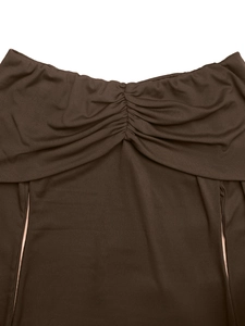 Detail of dark brown ribbed knit fabric with front ruched design and elastic neckline