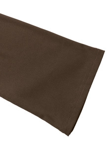 Detailed close-up of dark brown ribbed knit fabric with neat double-stitch hem finishing
