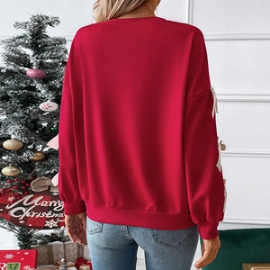 Festive red crewneck sweatshirt with white bows on sleeves for Christmas party fashion