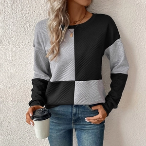 Women's long sleeve sweatshirt with black and grey textured plaid and round neck