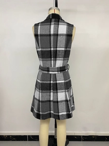 Detail of grey plaid sleeveless vest dress with matching tie belt and A-line cut