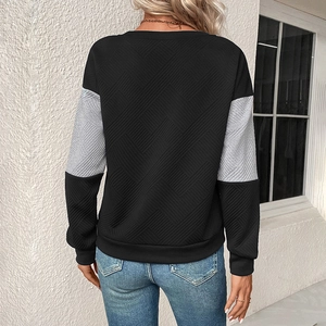 Women's crewneck sweatshirt featuring geometric textured fabric and black-grey color block
