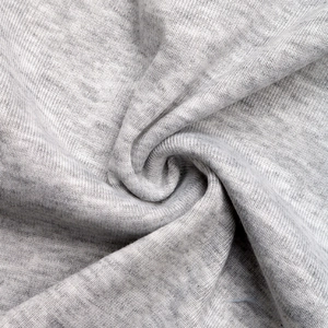 Close-up of heather grey knit fabric showing soft texture and fine fiber details
