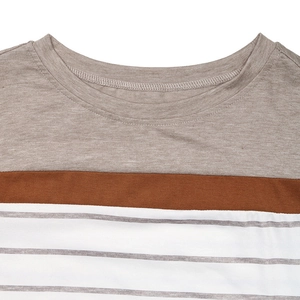 Close-up of crew neck detailing and striped patchwork fabric on casual long-sleeve tee