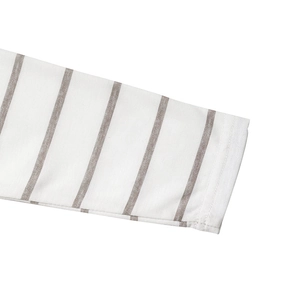 Macro detail of white and gray striped knit sleeve with precise double-needle stitching