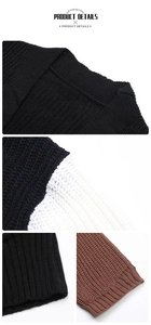 Détails du cardigan en maille épaisse montrant les textures noir, marron et bicolore