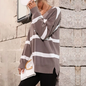Women's V-neck striped knit sweater in brown and white with long sleeves and side slits