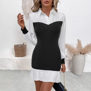 Elegant black and white contrast long sleeve dress with shirt collar and pleated hem