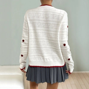 Elegant white knit cardigan with red heart patterns and contrast trim for women