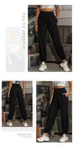 Women's black high-waisted drawstring joggers with elastic ankle cuffs and loose fit style