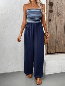 Detail of high-waisted wide-leg jumpsuit with blue striped elastic tube top