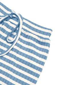 Detail of blue and white striped ribbed knit pants with elastic drawstring waist design