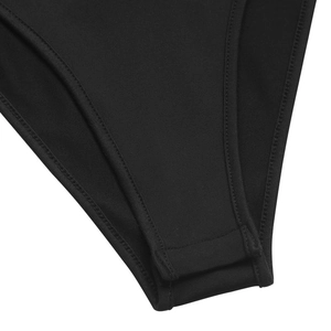 Detail macro shot of high-elastic black mesh bodysuit showing reinforced bottom seams
