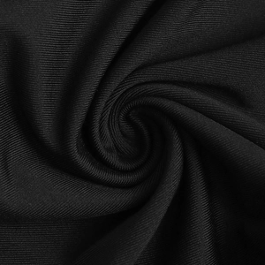 Macro view of black ribbed fabric texture with elegant vortex fold for bodysuits