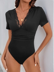 Slim fit black V-neck short sleeve bodysuit with delicate lace trim on neckline