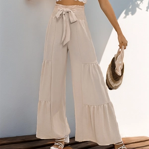 High waist smocked wide leg trousers with tiered ruffle design in light apricot beige