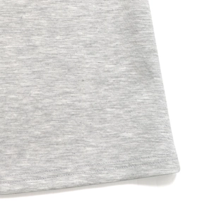 Macro detail of heather gray knitted fabric with double-needle hem stitching on casual pants