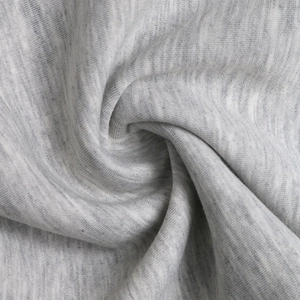 Detailed macro view showing the soft texture and grey marl knit fabric of flare pants