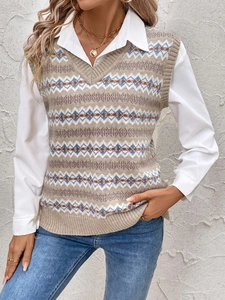 Close-up of Fair Isle jacquard knitted vest with V-neck layered over a white shirt