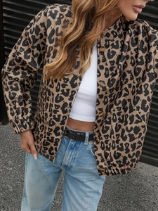 Close-up of leopard print jacket showing button closure and classic pointed shirt collar