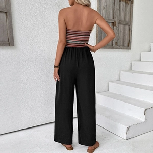Sleeveless tube top jumpsuit with colorful stripes and black wide leg trousers