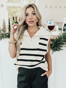 Detail of the high-quality zipper and polo collar on this striped knitted vest