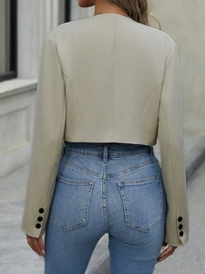 Women's minimalist short beige blazer jacket with back tailoring and buttoned cuffs