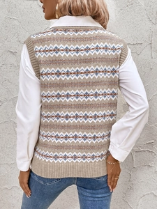 Back view of a Fair Isle jacquard knit vest with geometric patterns and ribbed edges