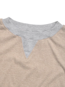 Close-up of khaki sweatshirt neckline featuring grey ribbed round neck and classic V-stitch detail