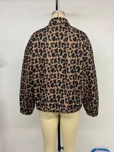 Detailed back view of leopard print jacket showing high collar and elastic ribbed hemline