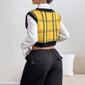 Women's V-neck knit plaid vest in yellow and black styled with white shirt and cargo pants