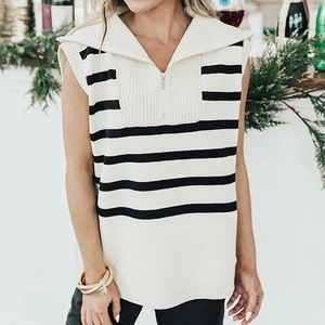 Women's black and white striped knit vest with a wide collar and half-zipper detail
