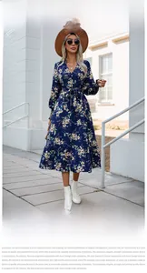 Floral V-neck long sleeve dress in navy blue with waist belt and ruffle hem detail