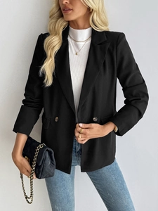 Women's black double-breasted blazer with notch lapels and classic flap pockets